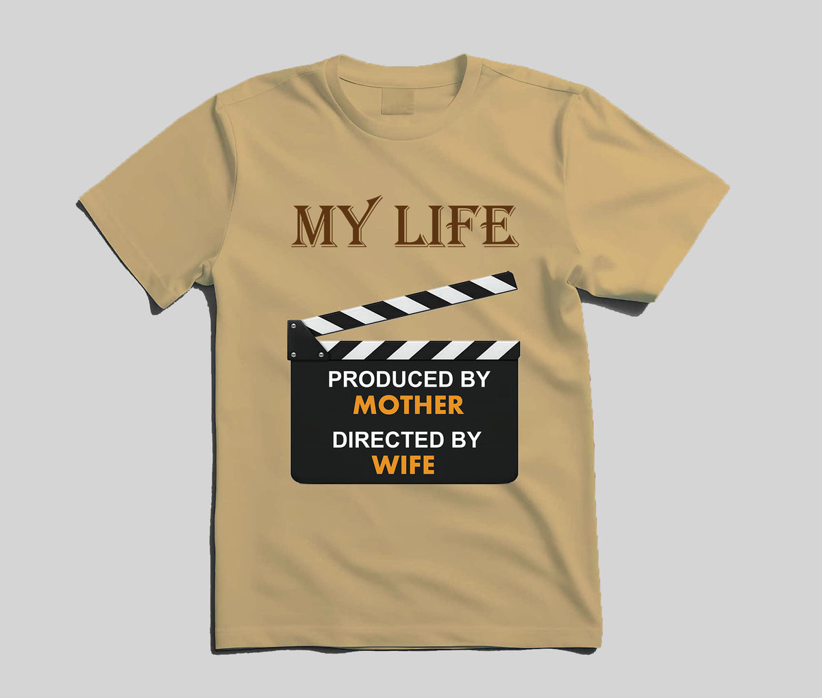 A beige short-sleeve t-shirt with a graphic print on the front. The graphic features the text 'MY LIFE' in brown serif letters above a black-and-white clapperboard.