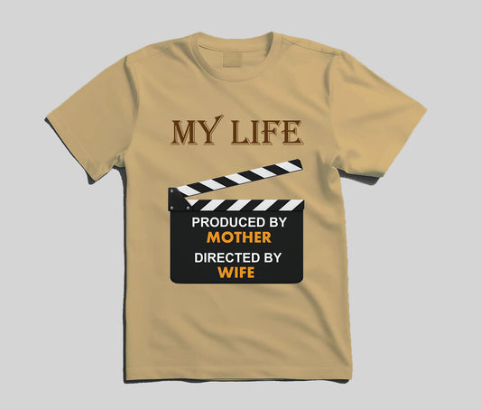 A beige short-sleeve t-shirt with a graphic print on the front. The graphic features the text 'MY LIFE' in brown serif letters above a black-and-white clapperboard.